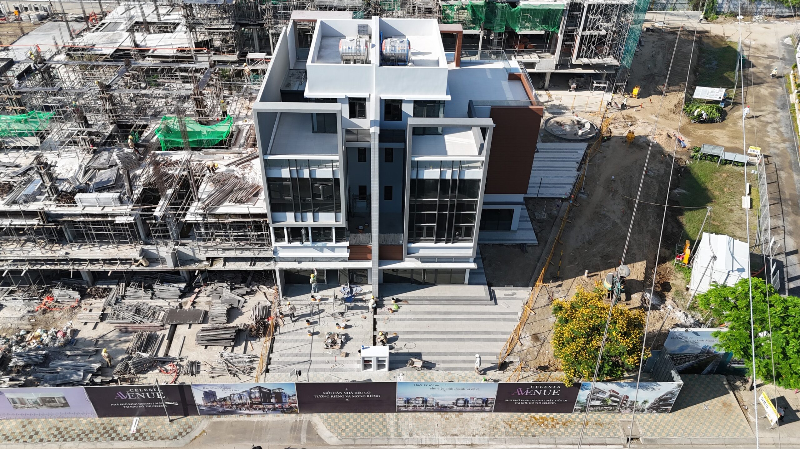 Slider Zone 1: Units C.01 and C.02 are under tiling works for yards and balcony railing installation.